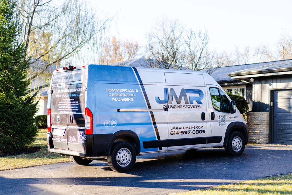 Plumbing Service Van in Residential Driveway in Grove City Plumbing Service Van in Residential Driveway in Grove City